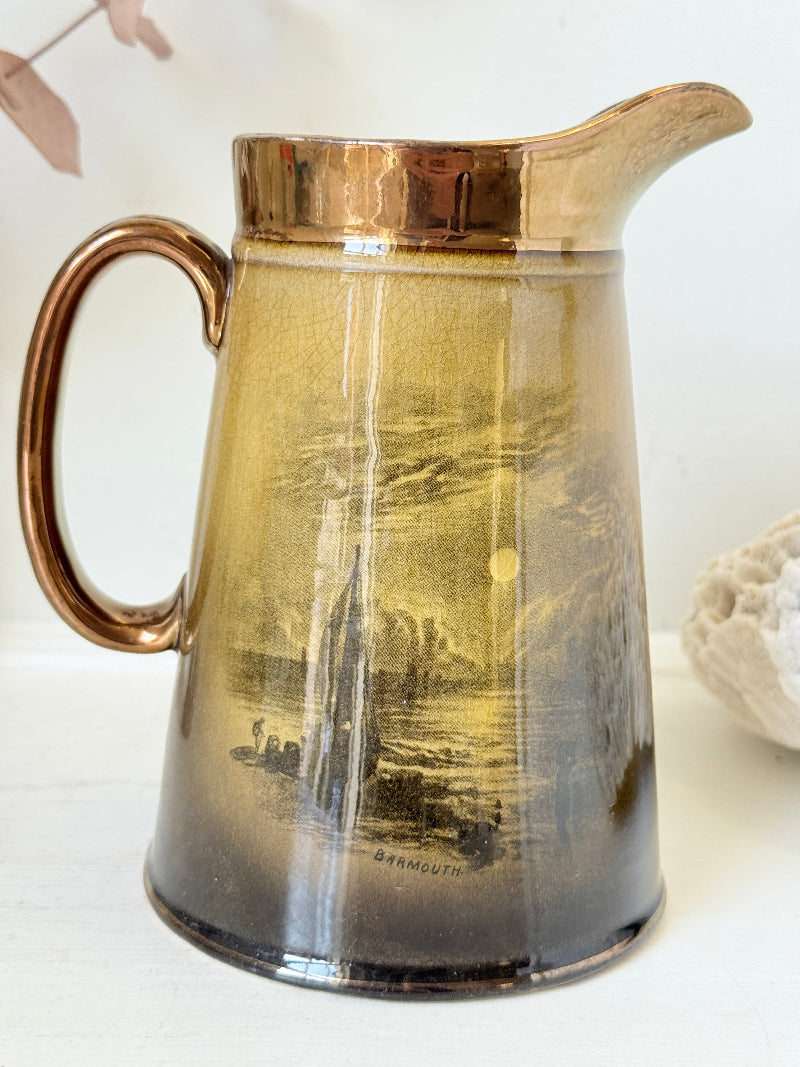 Vintage Ridgways Royal Vistas Ware ceramic jug in brown tones with scenic transfer print, photographed on a white surface
