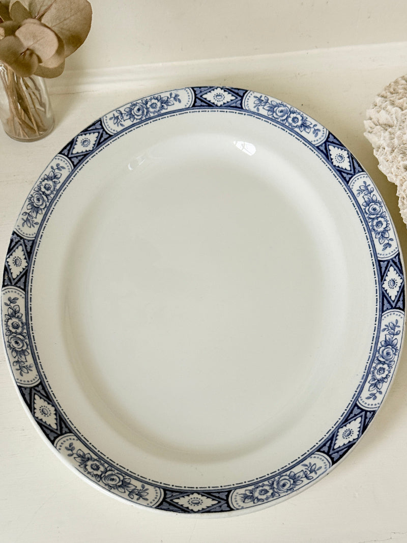 Vintage Burleigh Ware blue and white oval serving platter photographed on a white surface