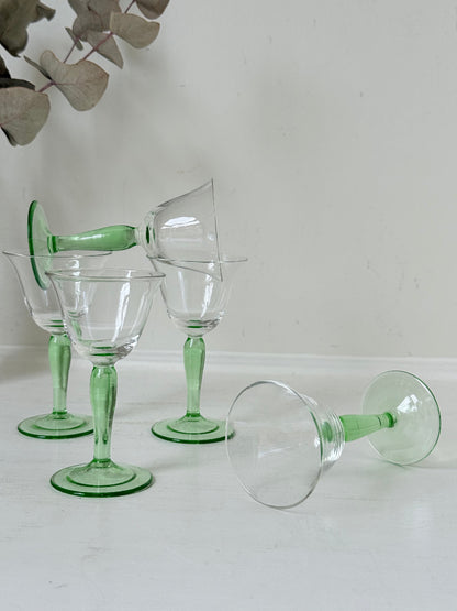 Set of five green stemmed liqueur glasses