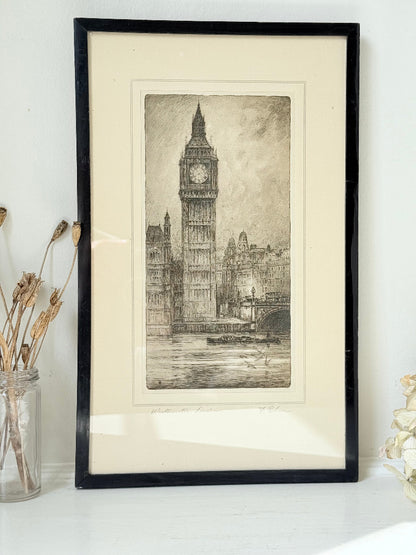 Vintage framed print of Big Ben in London, black frame, photographed on white surface with dried flowers