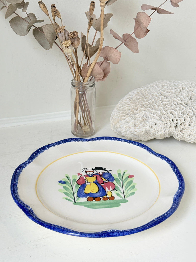 Vintage French ceramic serving plate by Faïencerie de Pornic with Quimper style Breton couple design and blue scalloped rim