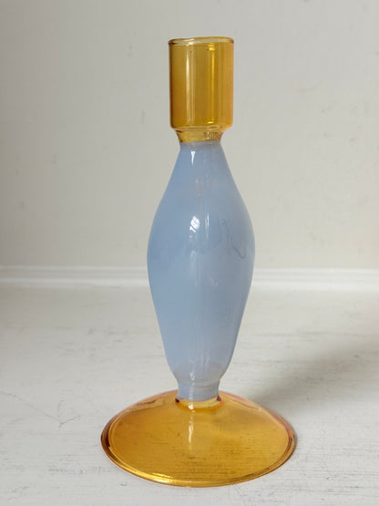 Pair of &amp;Klevering Amsterdam Flux glass candle holders in light blue and amber with pink taper candles