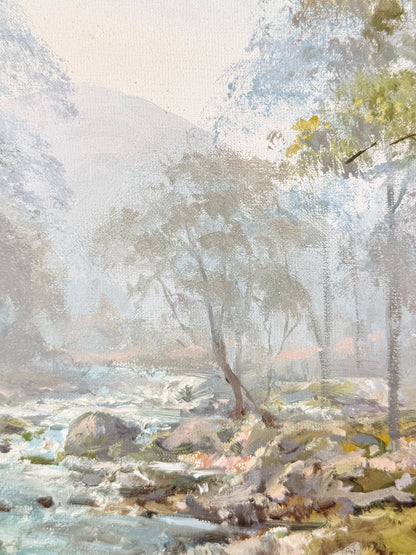 Impressionistic landscape painting of a misty forest stream with trees, rocks, and soft blue-gray and green tones.