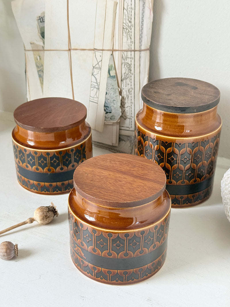 Hornsea Heirloom coffee tea and sugar canister set in autumn brown stoneware with teak lids photographed on a white surface