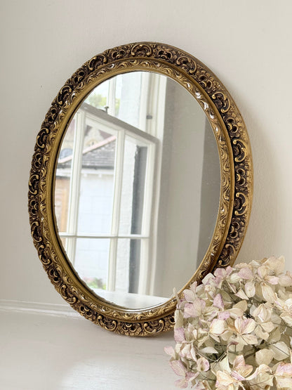vintage gold oval mirror with ornate gilt painted frame