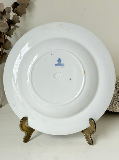 Minton Blue Willow serving dish dated 1928 with blue transfer pattern shown on a white surface.