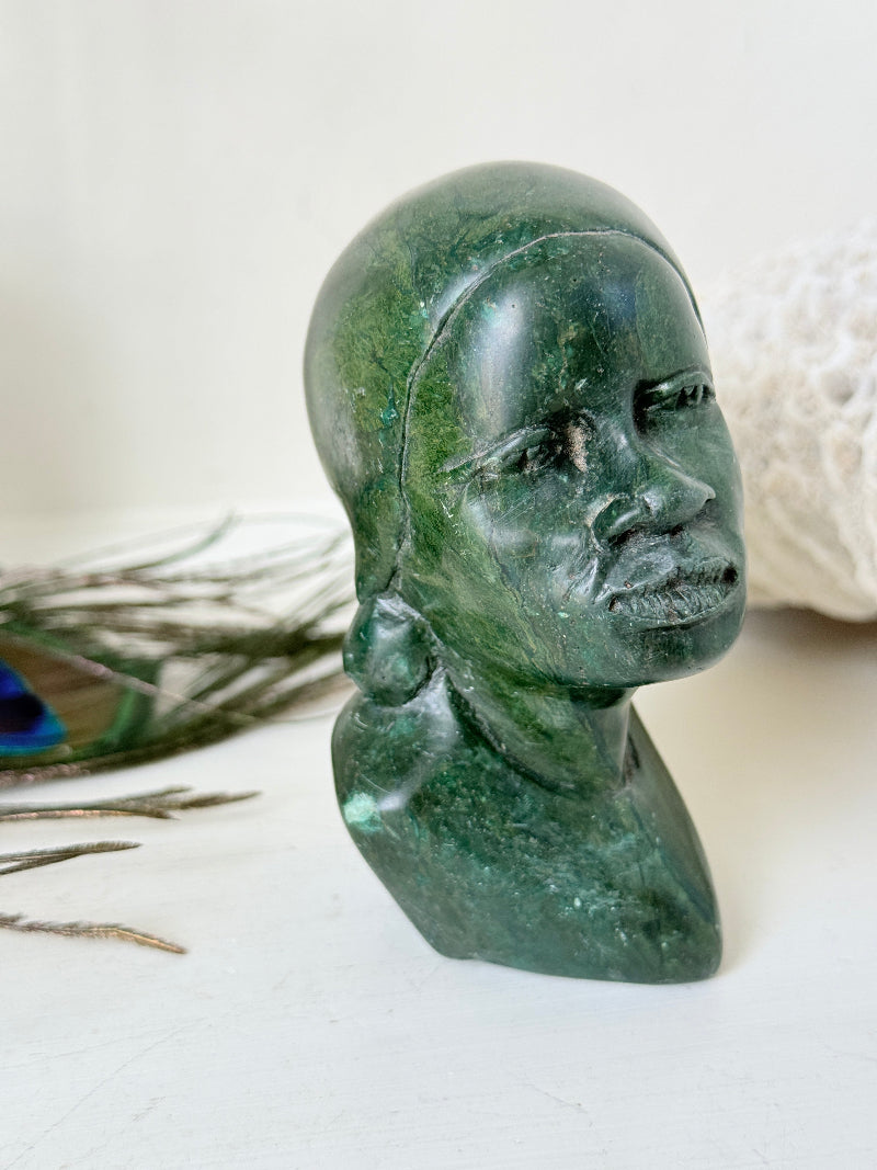 Barnabas Fombe verdite Shona bust of a woman with a head wrap, signed, from Zimbabwe