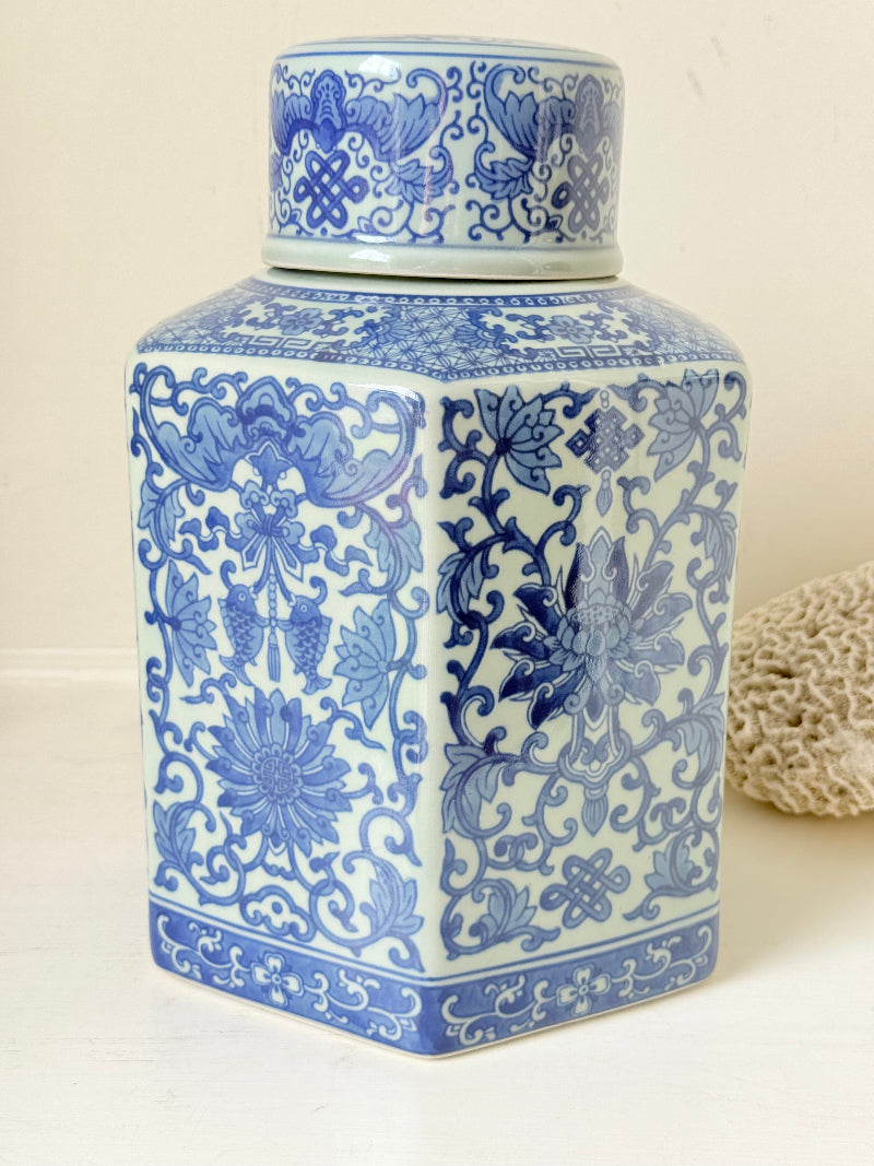 Blue and white floral ginger jar by Gisela Graham, photographed on a white surface