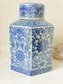 Blue and white floral ginger jar by Gisela Graham, photographed on a white surface