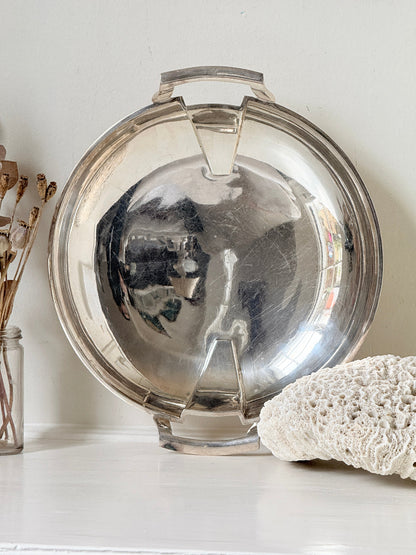 Art Deco silver plate serving dish with stepped handles on a white surface, Goldsmiths and Silversmiths Company Regent Plate