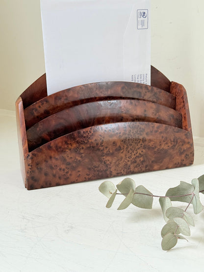Three-slot curved letter rack made from polished burl wood with rich swirling grain, mid-century style desk organiser.