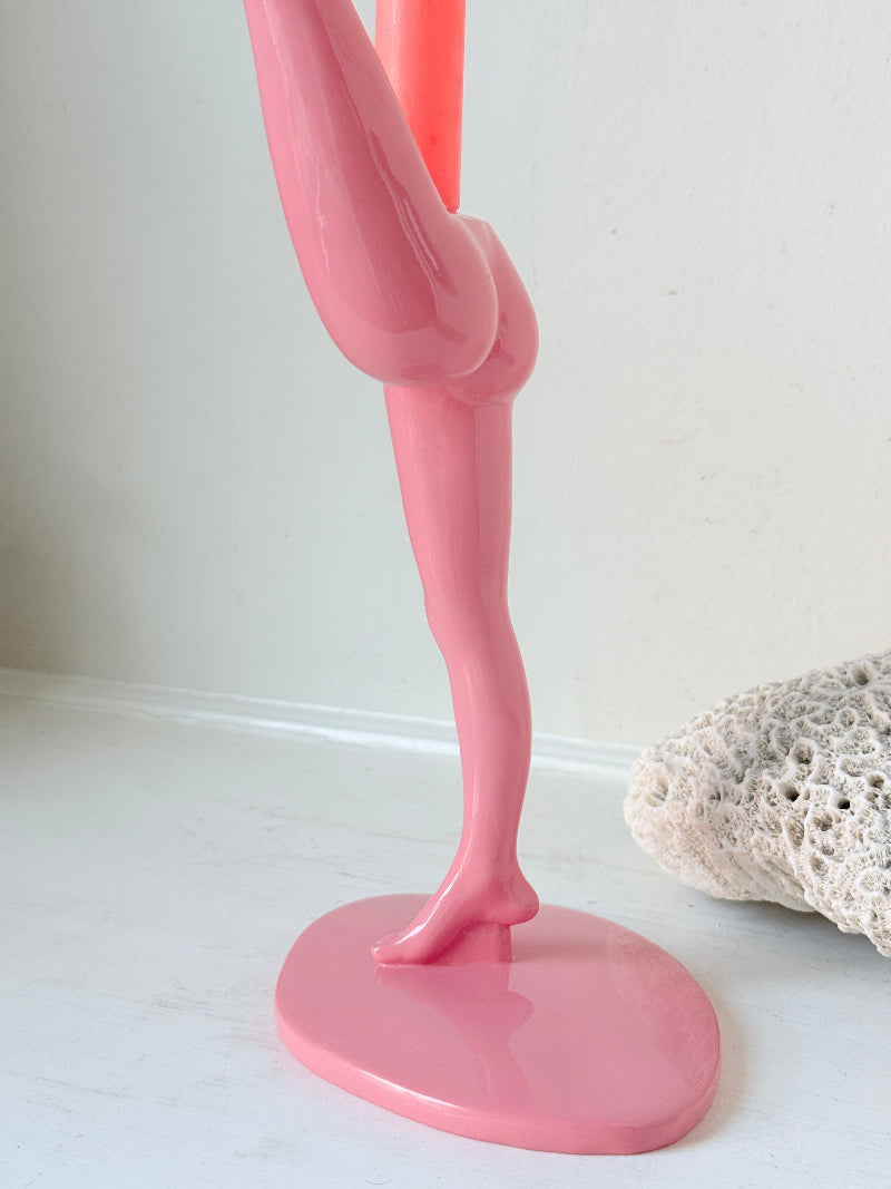 Anissa Kermiche Can Can Candlestick in Shine Pink resin with sculptural kicking leg design and taper candle