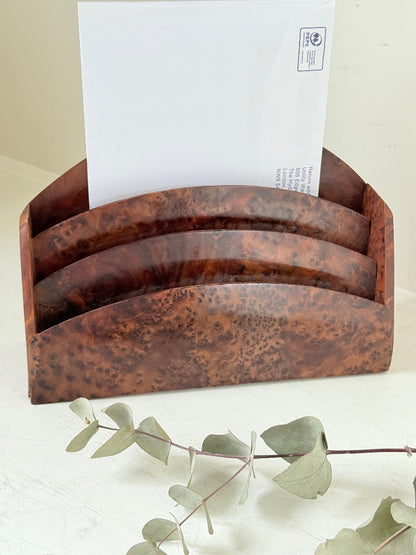 Three-slot curved letter rack made from polished burl wood with rich swirling grain, mid-century style desk organiser.
