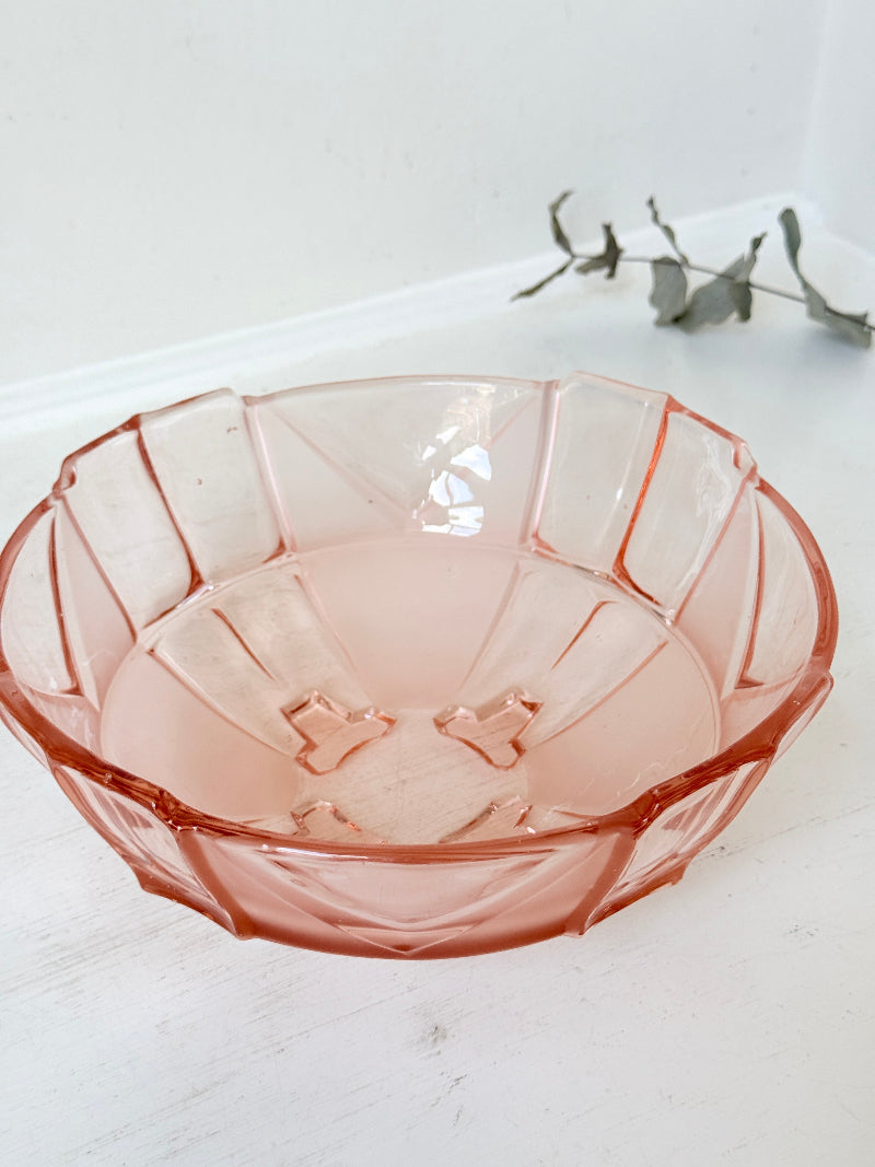 Art Deco pink pressed glass dessert service with scalloped serving bowl and four footed sundae dishes