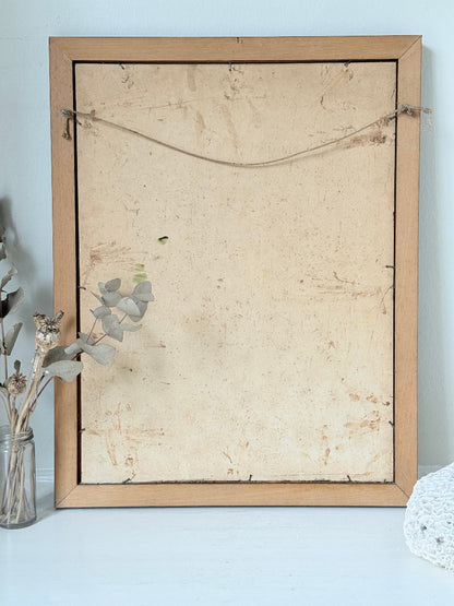 Oil painting of a dog by Muriel Hester Broughton in wooden frame, photographed on white surface.