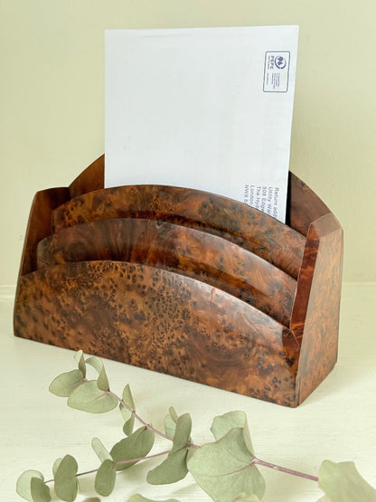 Three-slot curved letter rack made from polished burl wood with rich swirling grain, mid-century style desk organiser.