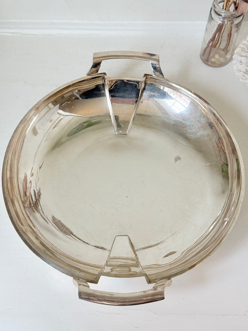 Art Deco silver plate serving dish with stepped handles on a white surface, Goldsmiths and Silversmiths Company Regent Plate