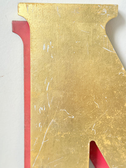 Vintage Shop Sign Letter N in Gold and Red with Serif Detail