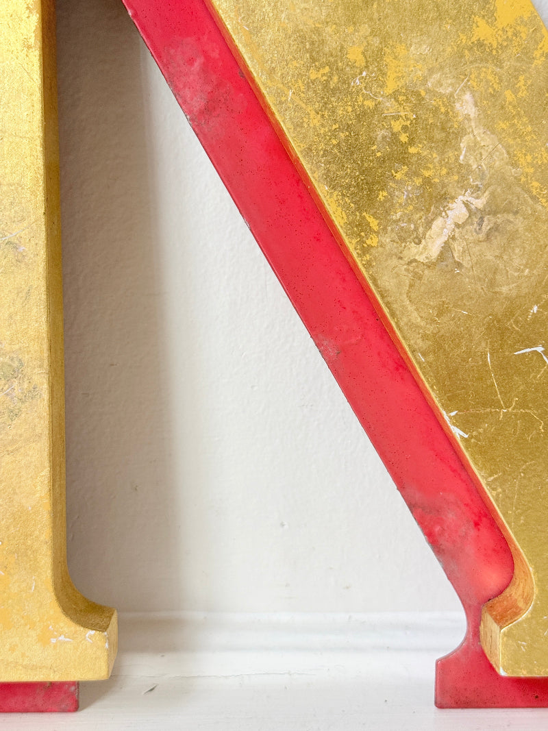Vintage Shop Sign Letter N in Gold and Red with Serif Detail