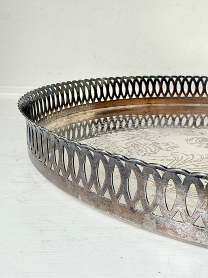 Vintage round silver plated gallery tray with pierced rim, engraved centre and aged patina for drinks or vanity styling