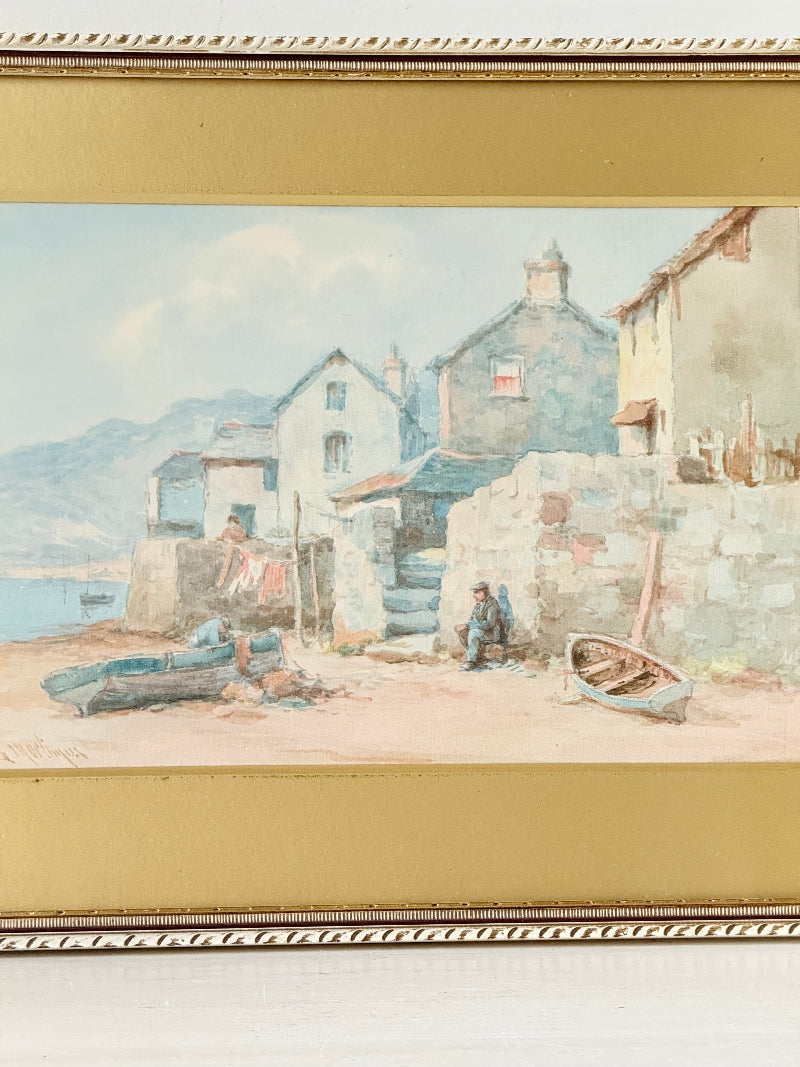 Vintage watercolour of fishing village with boats, gold mount, and ornate gilt frame