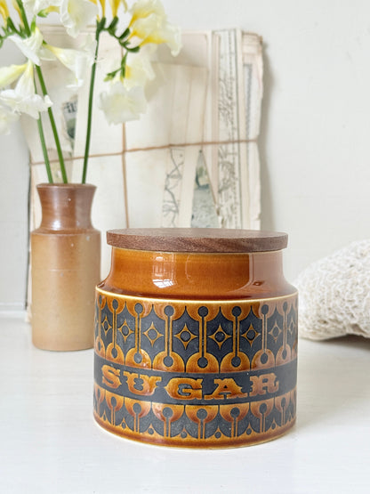 Vintage Hornsea Pottery Heirloom sugar canister in brown glaze with embossed pattern, wooden lid and 1970s kitchen style