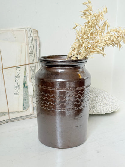Vintage glazed stoneware pot with treacle brown glaze, incised banded decoration and wide rim for kitchen or shelf styling