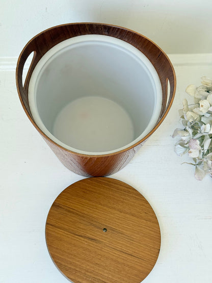 Vintage Swedish teak ice bucket with lid and white liner, photographed on a white surface