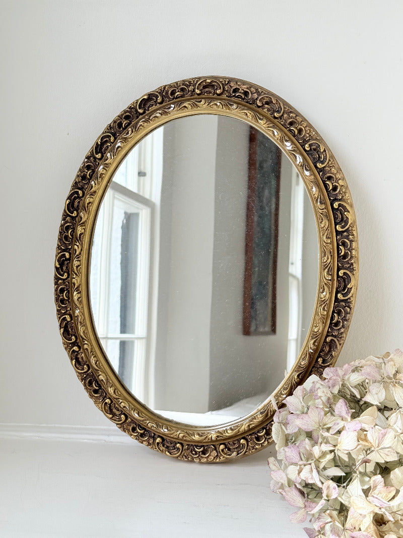 vintage gold oval mirror with ornate gilt painted frame