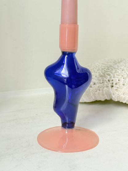 Pair of &amp;Klevering Amsterdam Flux glass candle holders in dark blue and pink with pink taper candles