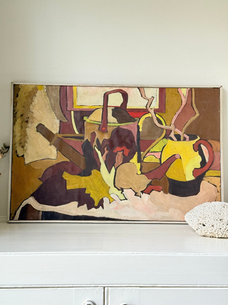 Mid century still life with watering can, oil on paper mounted on board, in ochre and plum tones, photographed on a white surface.