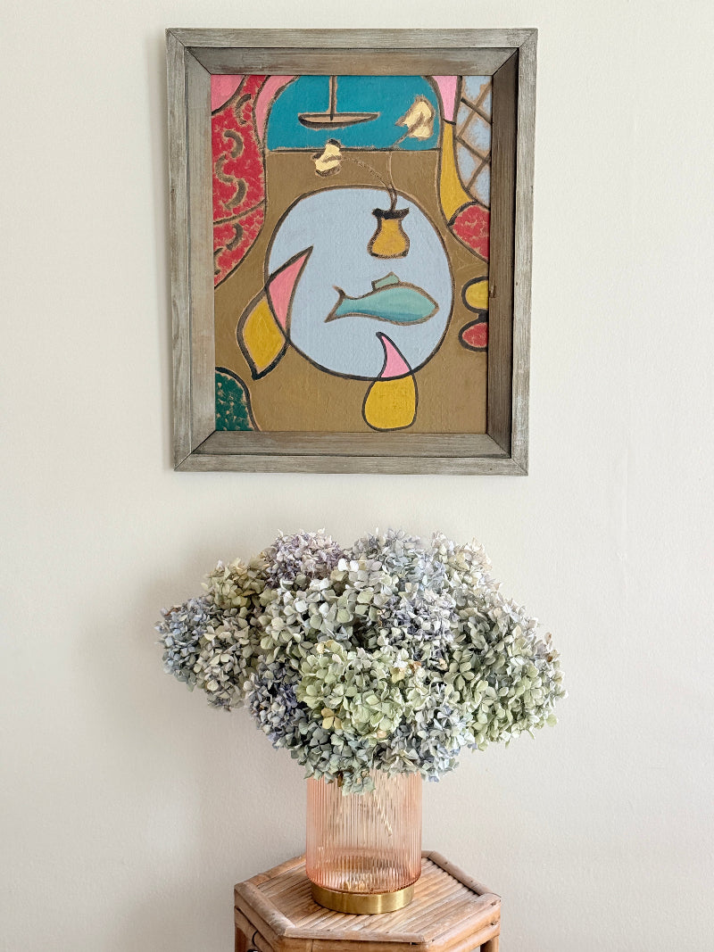St Ives School mixed media painting on board of semi abstract objects on a table by a coastal window in a grey frame