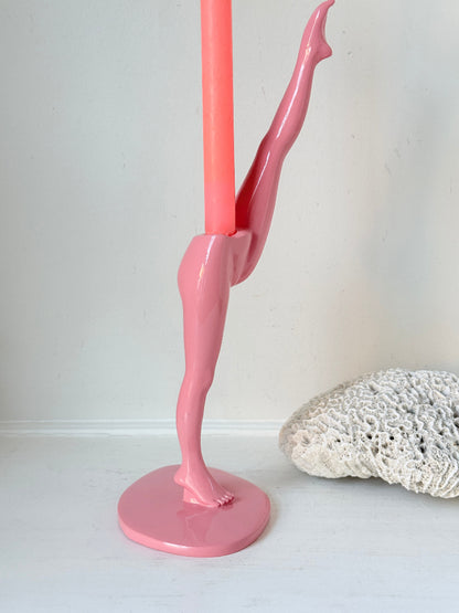 Anissa Kermiche Can Can Candlestick in Shine Pink resin with sculptural kicking leg design and taper candle