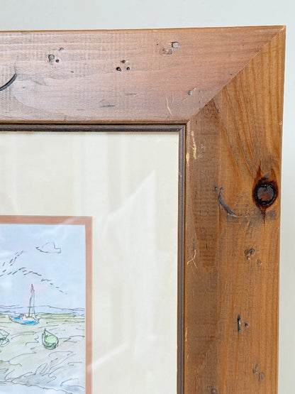 Vintage pen and watercolour coastal scene with horse and cart in rustic wood frame, signed, on white surface.