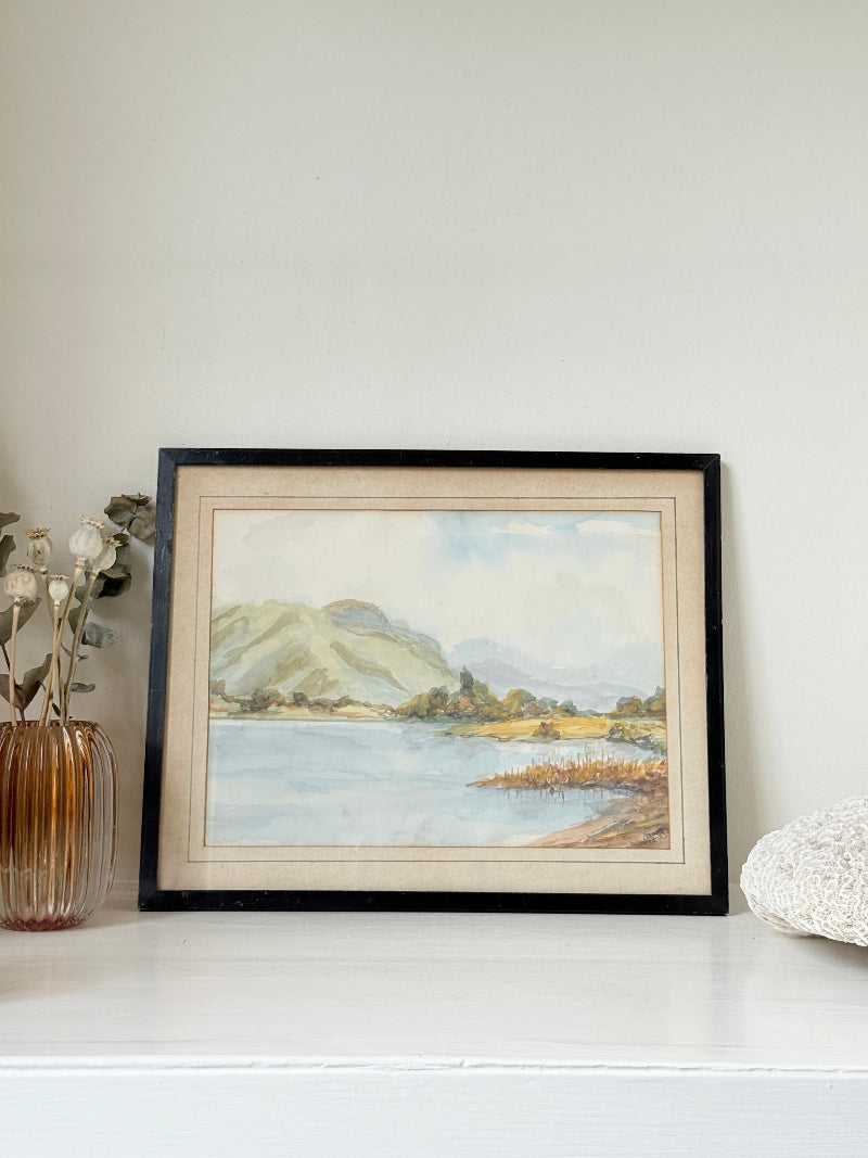 Vintage signed watercolour landscape of mountains and lake in black frame