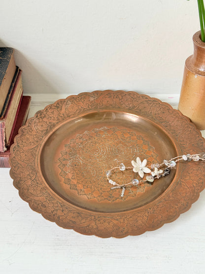 Vintage hand engraved copper tray with scalloped edge, bird and floral motif and warm aged patina for boho interiors