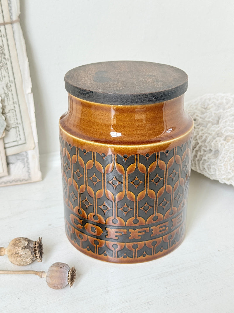Hornsea Heirloom coffee storage jar in autumn brown stoneware with teak lid photographed on a white surface