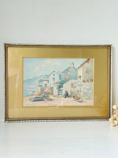 Vintage watercolour of fishing village with boats, gold mount, and ornate gilt frame
