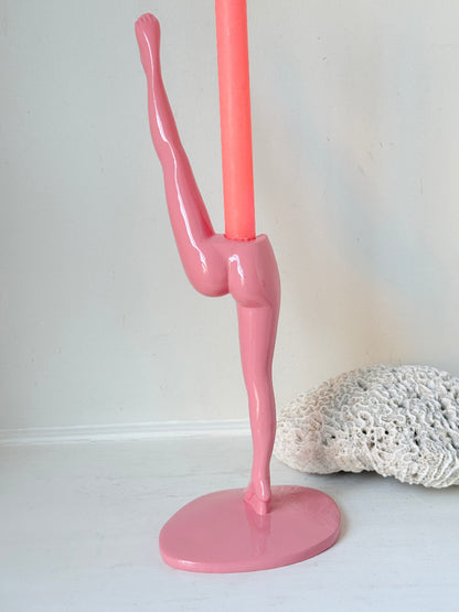 Anissa Kermiche Can Can Candlestick in Shine Pink resin with sculptural kicking leg design and taper candle