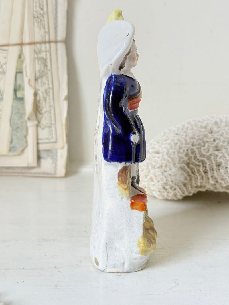 Victorian Staffordshire flatback clock group with girl spaniel and parrot hand painted in cobalt blue and orange