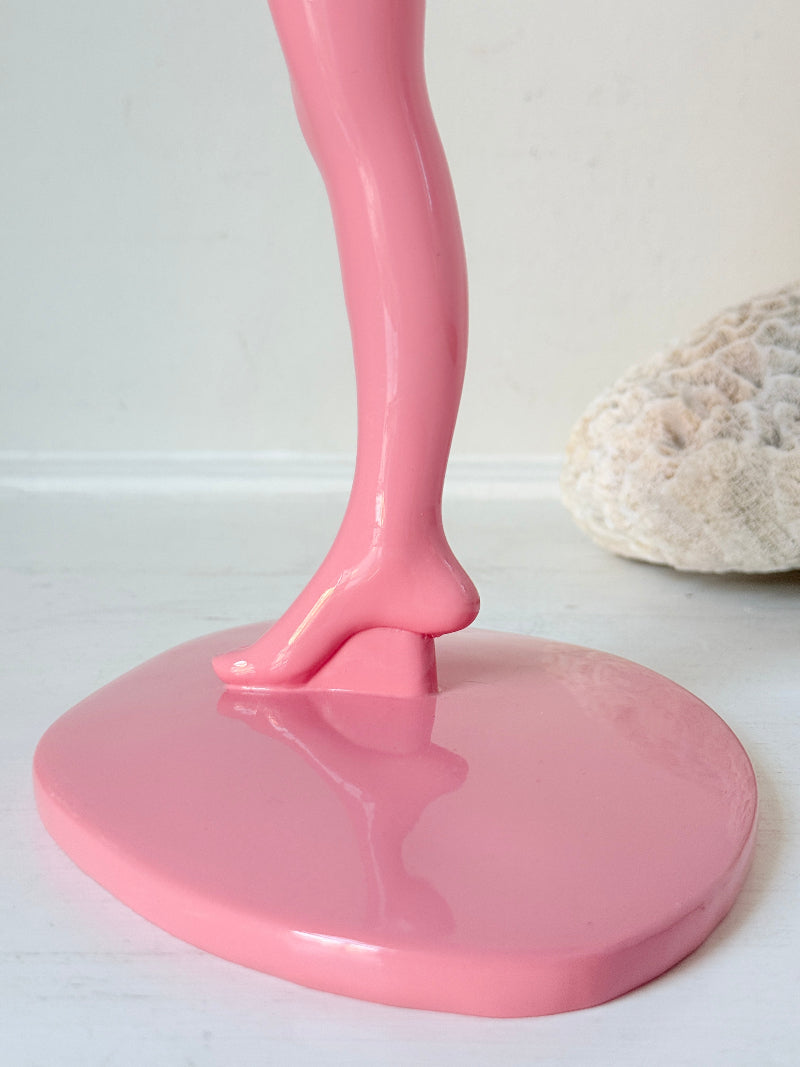 Anissa Kermiche Can Can Candlestick in Shine Pink resin with sculptural kicking leg design and taper candle