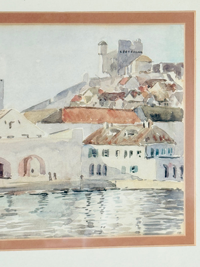 Framed watercolour painting of Dubrovnik harbour and old town architecture, photographed on a white surface