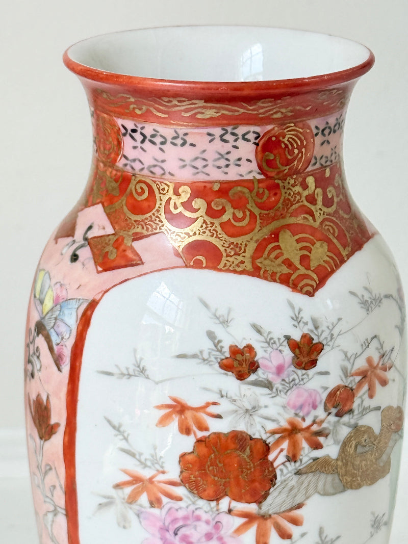 Japanese Kutani porcelain vase hand painted with flowers in white panels on an iron red and gold ground