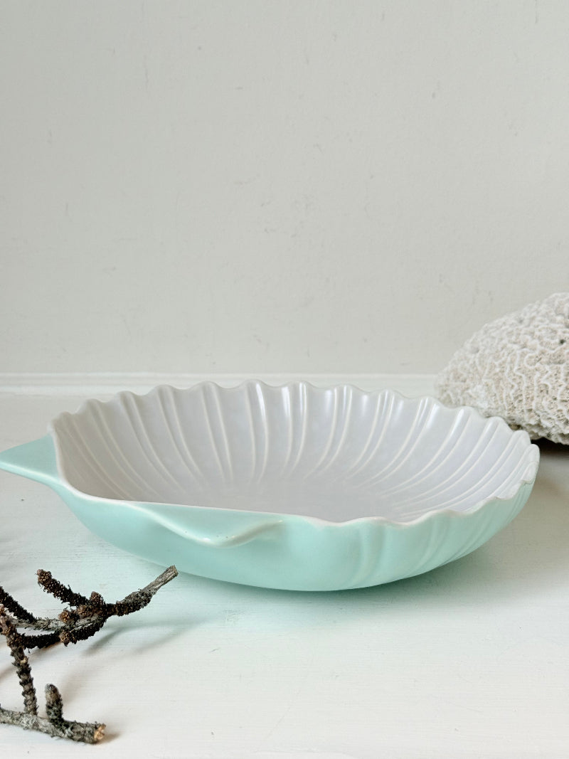 Poole Pottery scallop shell serving dish in white and seafoam glaze photographed on a white surface