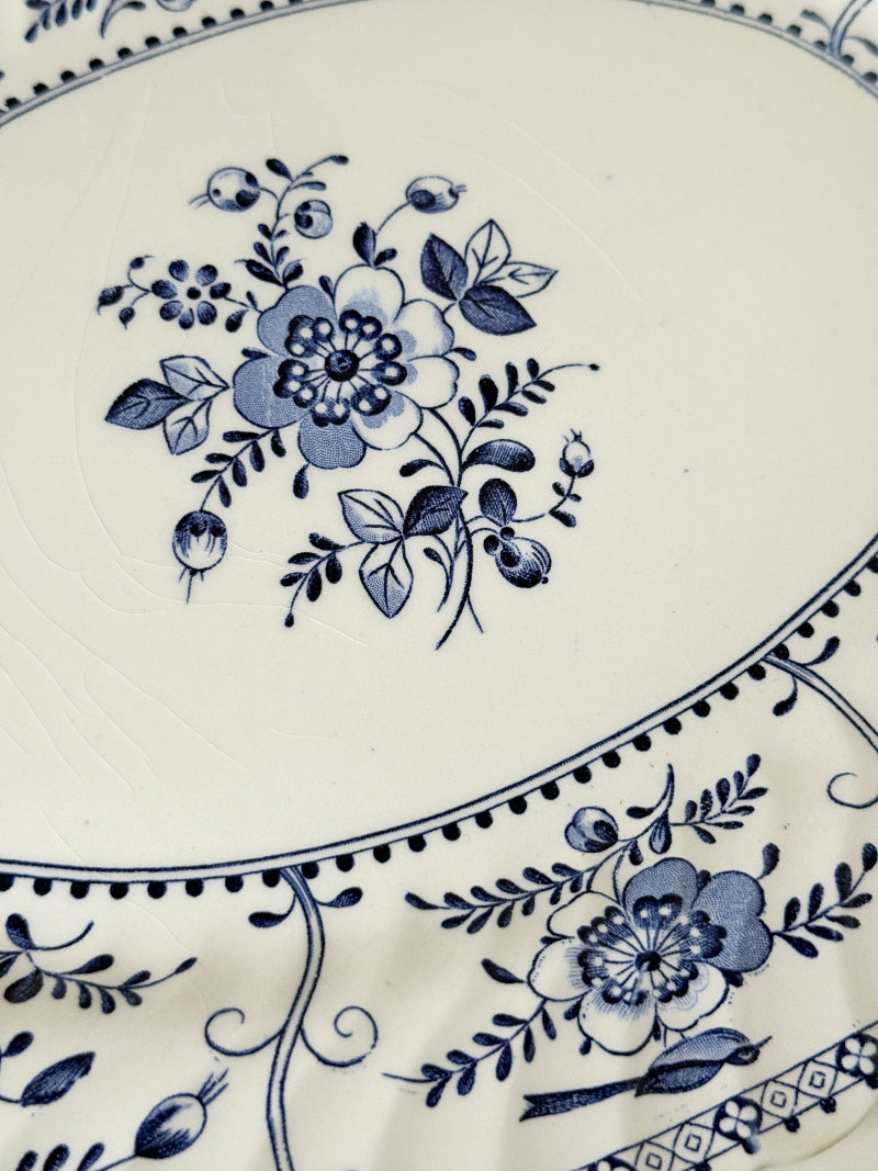 Vintage Johnson Brothers Indies blue and white oval serving platter photographed on a white surface
