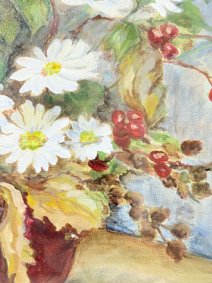 Vintage oil painting on board of daisies in a vase, framed under glass and photographed on a white surface beside dried flowers.