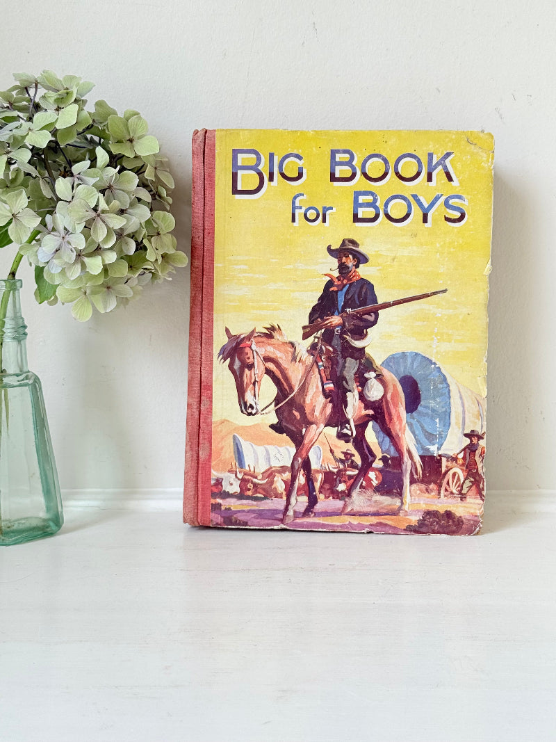 Vintage Big Book for Boys annual with illustrated cover and inscription dated 1941, photographed on a white surface