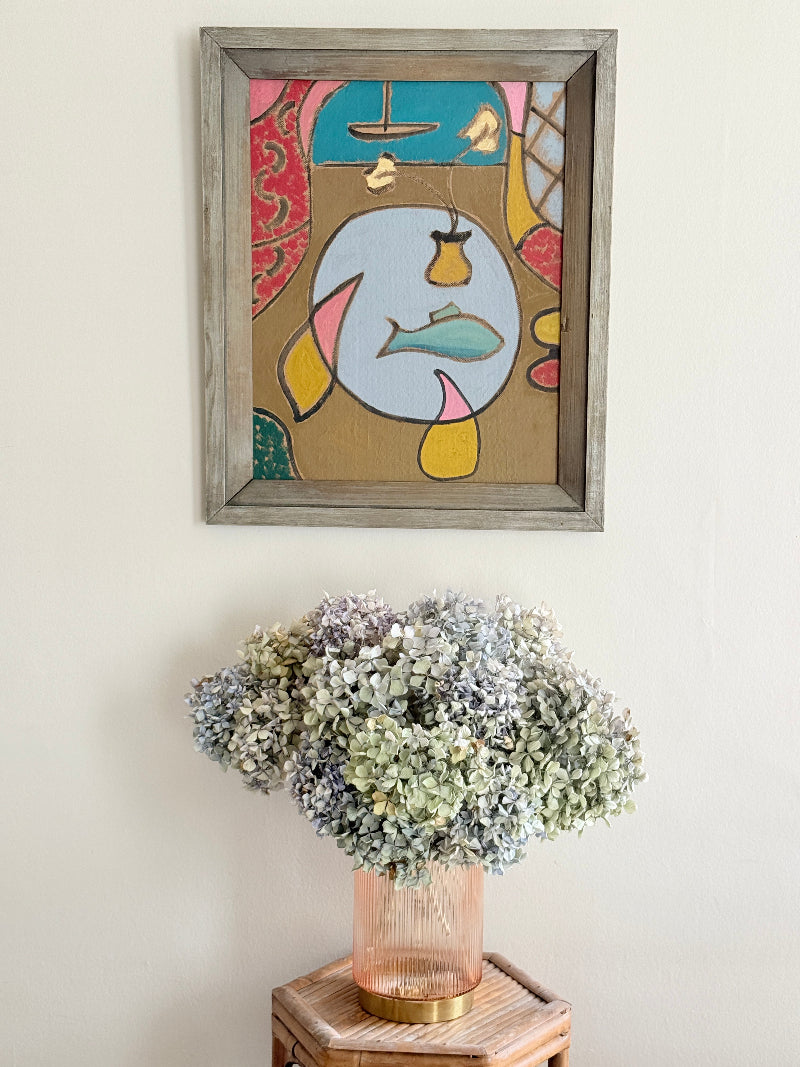 St Ives School mixed media painting on board of semi abstract objects on a table by a coastal window in a grey frame