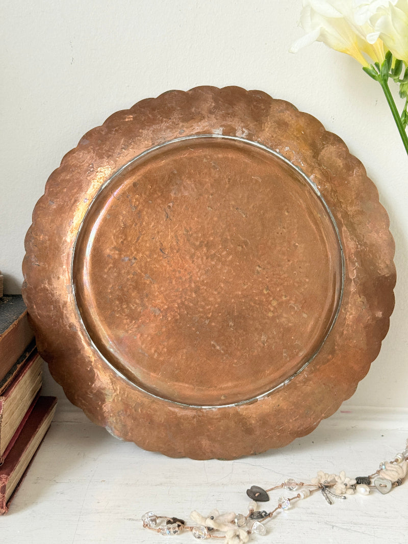 Vintage hand engraved copper tray with scalloped edge, bird and floral motif and warm aged patina for boho interiors