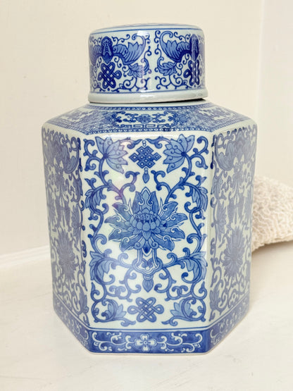 Blue and white floral ginger jar by Gisela Graham, photographed on a white surface
